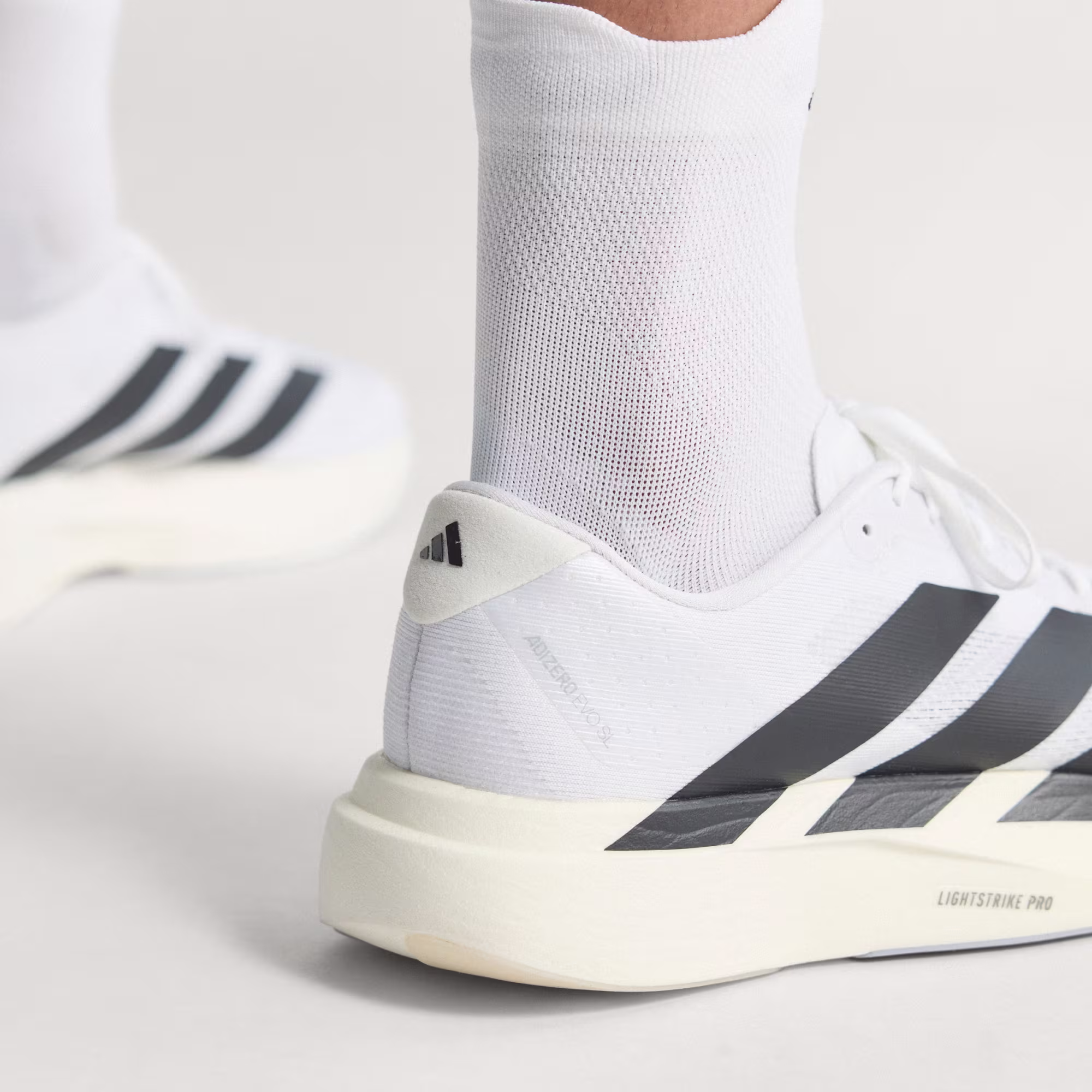 Adidas Adizero EVO SL Woven Ανδρικό Αντικραδασμικό Παπούτσι Τρεξίματος Cloud White / Core Black / Cloud White - Image 7